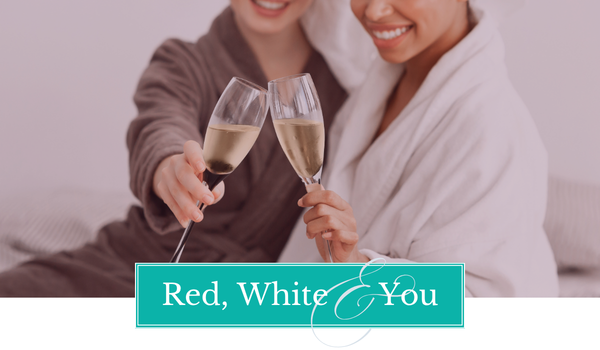 a couple toasting champagne for Fourth of July week at Spa Evangeline in south Tampa